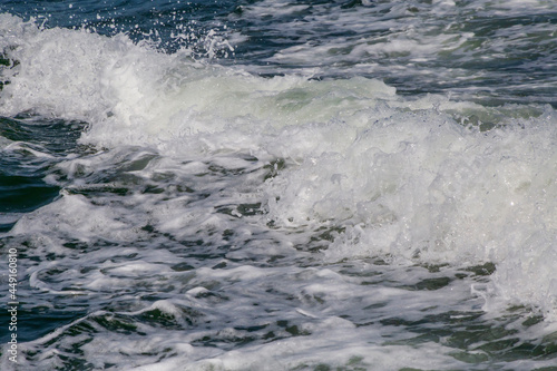close up of foamy sea wave