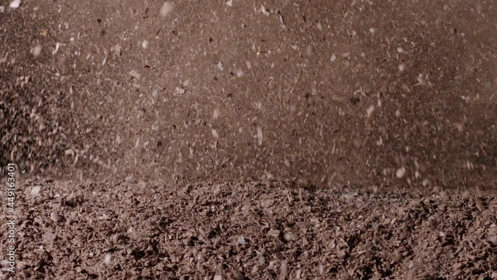 Explosion of dirty ground pattern in slow-motion Explosion of dirty ground pattern in slow-motion