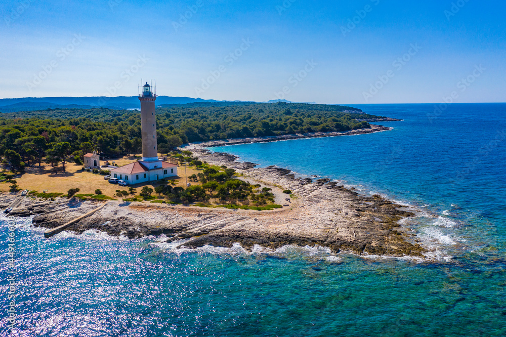 Fototapeta premium Aerial view of the old lighthouse of Veli Rat on the island of Dugi Otok, Croatia, beautiful seascape