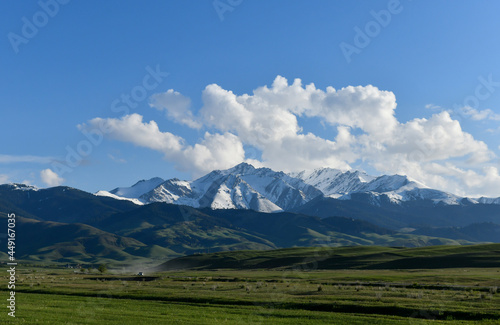 Mountain landscape with clouds and road, Kazakhstan, Almaty region