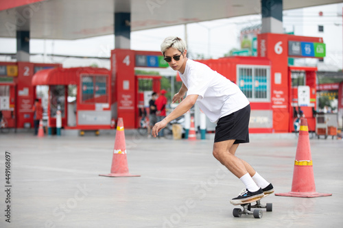 young man skater riding on skateboard