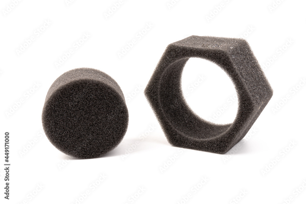 piece of foam rubber on white background. Black sponge piece of foam rubber on white background. Black sponge