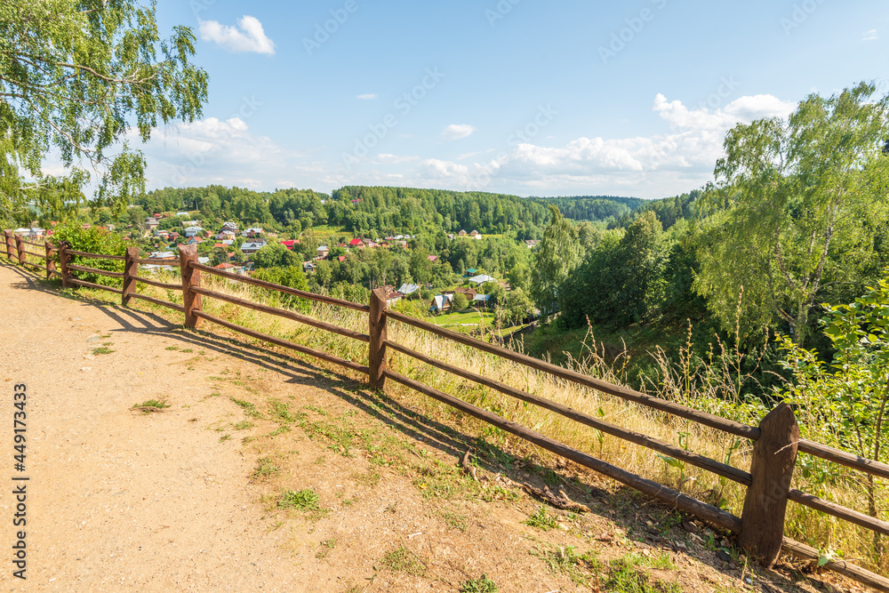 Scenic view of town of Plyos on bank of Shokhonka river in summer, Ivanovo region, Russia.