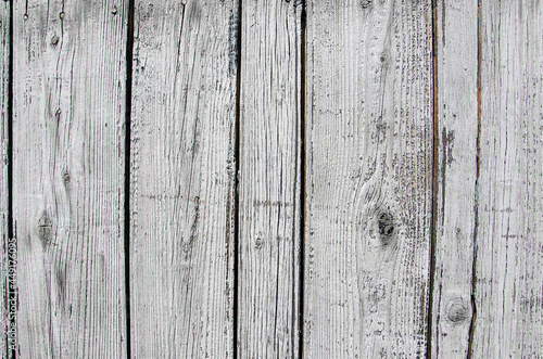 wooden background with old unpainted boards. Gray wooden boards. Old wooden boards.