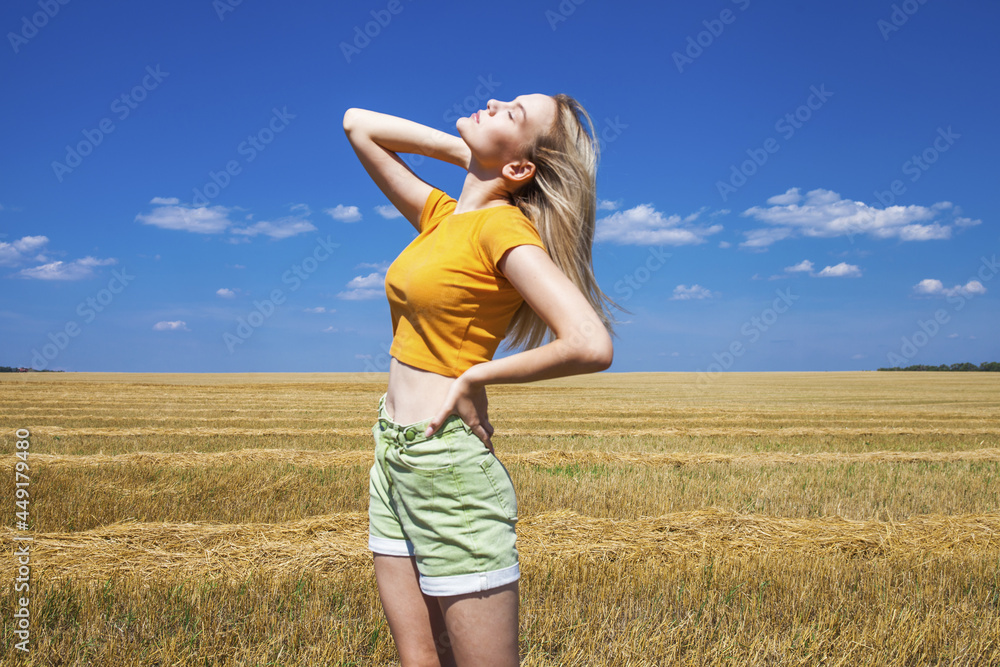 Young blonde girl in wheat field Young blonde girl in wheat field
