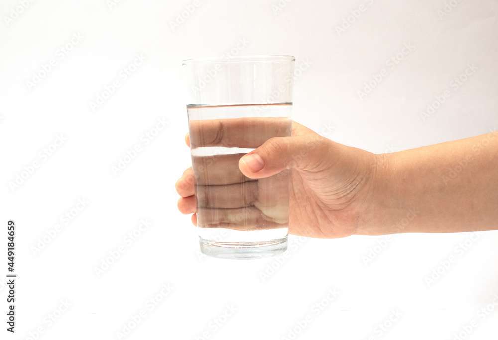 holding a glass cup on a white background holding a glass cup on a white background