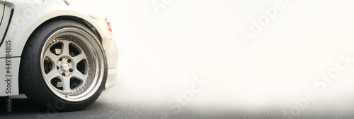 Bilde på lerret Super car wheel and smoke on road using as background cover page motor sport, tr