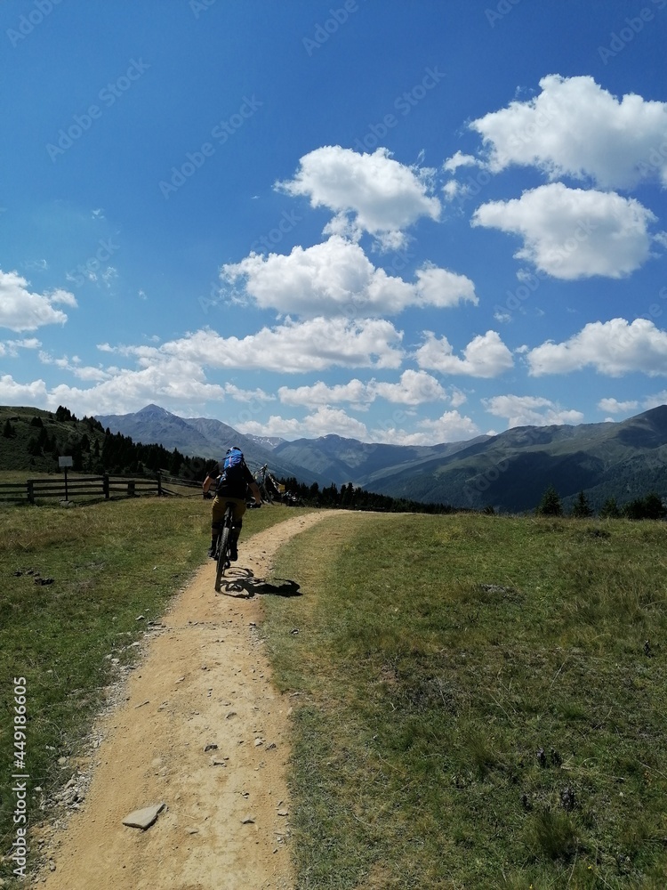 Fototapeta premium Mountain biking in the beautiful valleys and landscapes of South Tyrol in the Dolomites in Northern Italy