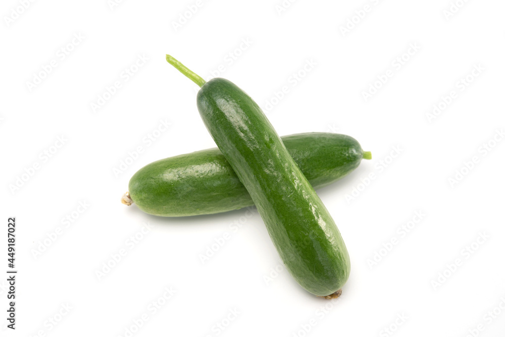 Fresh mini cucumbers isolated on white background. Healthy food Fresh mini cucumbers isolated on white background. Healthy food