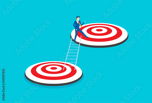 Businessman climb up ladder reaching goal target