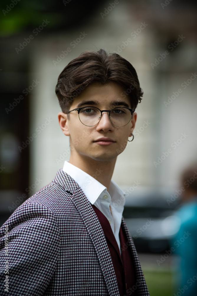 Young man in a formal suit outdoor in the city Young man in a formal suit outdoor in the city