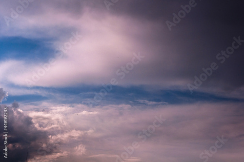 Dramatic blue sky with white and grey clouds © Anna Nagula