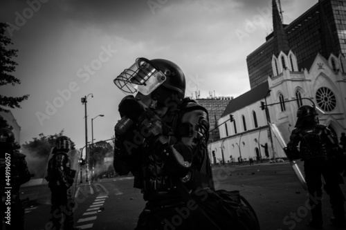 Canvas Print SMAD Police and Hooded Confrontation Bogotá Colombia