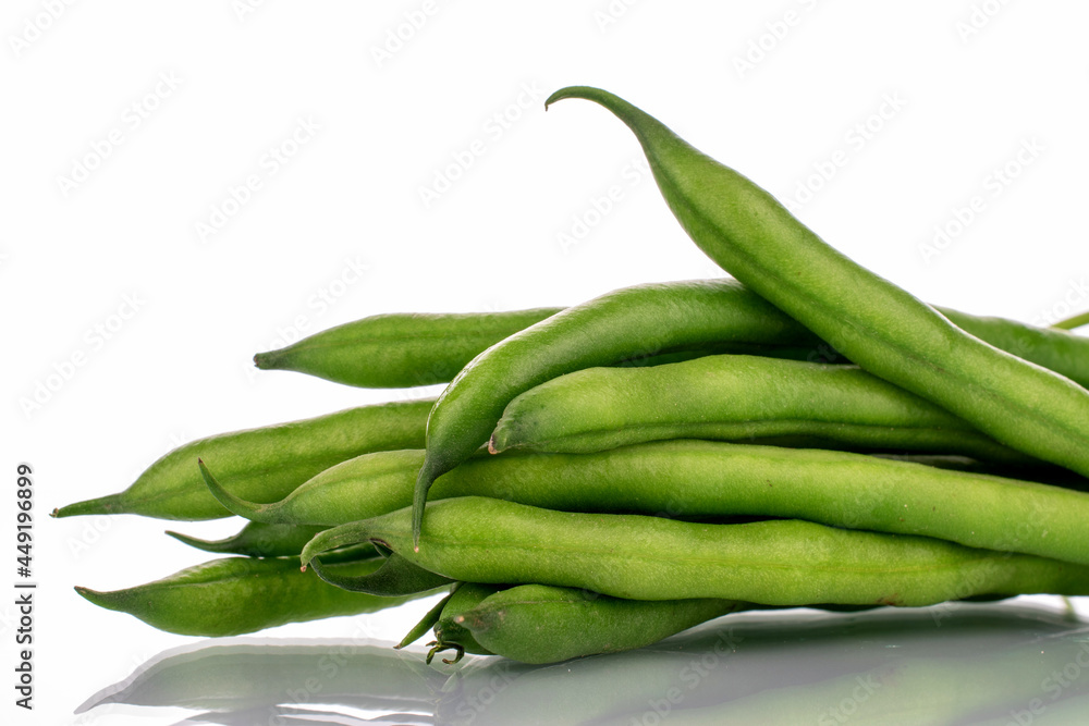 Several ripe green beans, close-up, isolated on white. Several ripe green beans, close-up, isolated on white.