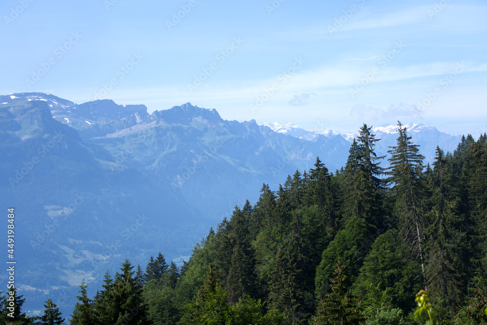 Panoramic view from mountain Brienzer Rothorn at Bernese Highland on a beautiful sunny summer day. Photo taken July 21st, 2021, Flühli, Switzerland.