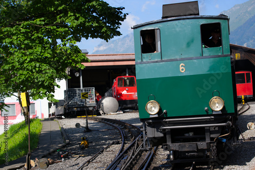 Close-up of cog wheel railway steam train of Brienz Rothorn Bahn at mountain station. Photo taken July 21st, 2021, Flühli, Switzerland. 