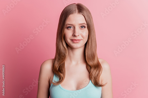 Portrait of charming gorgeous dreamy lady look camera on pink background