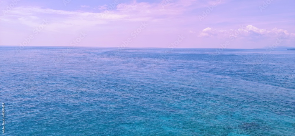Fototapeta premium blue sky and sea beautiful ocean purple sea twilight sky sky and ocean nature cloud beach natural beauty water ocean diving wallpaper background