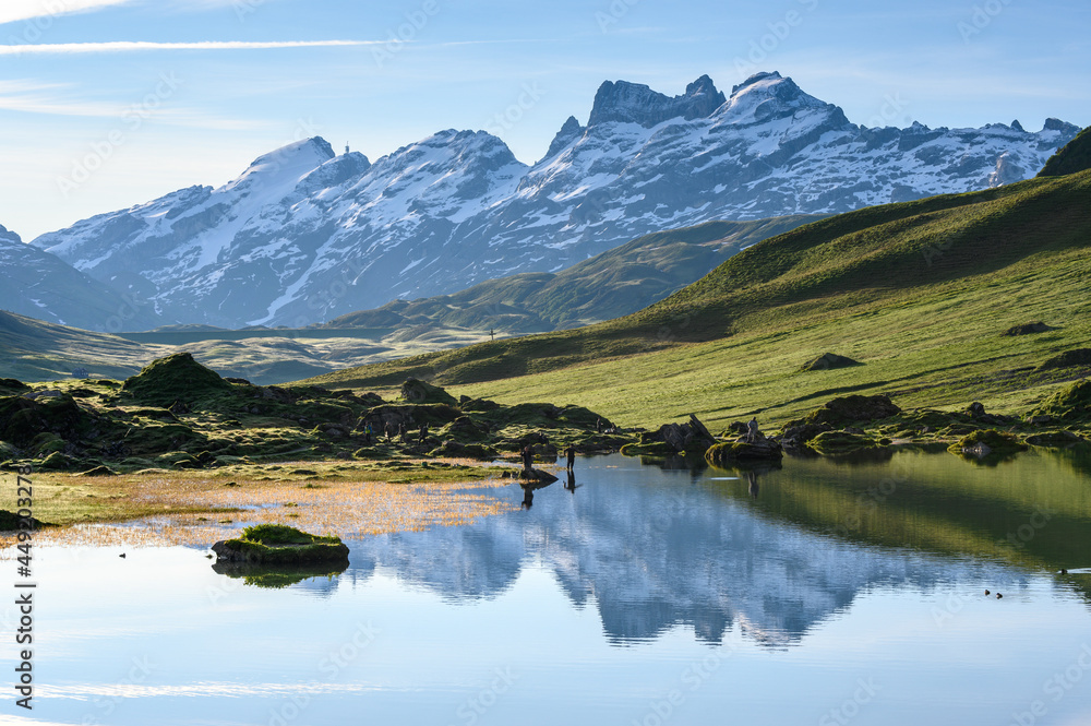 Mount Titlis with reflection in an alpine Lake near Melchseefrutt