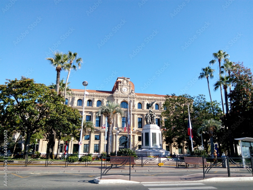 Panoramic view Town Hall of Cannes in the morning sun light. Scenic France country on a sunny summer day. Wonderful journey to Azure Coast in French Riviera.