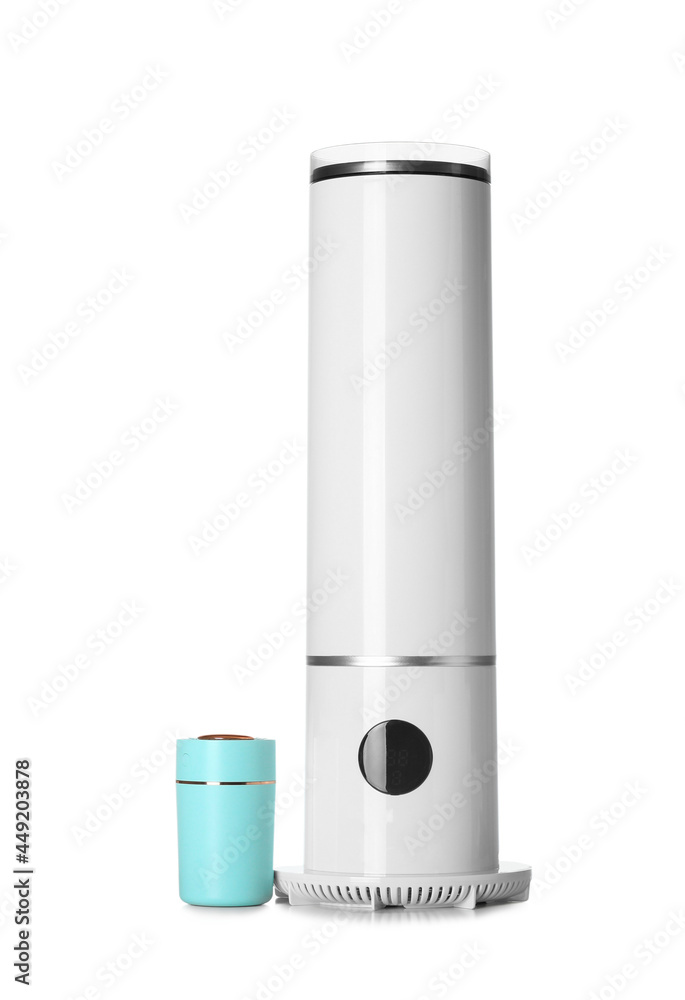 Modern humidifiers on white background Modern humidifiers on white background