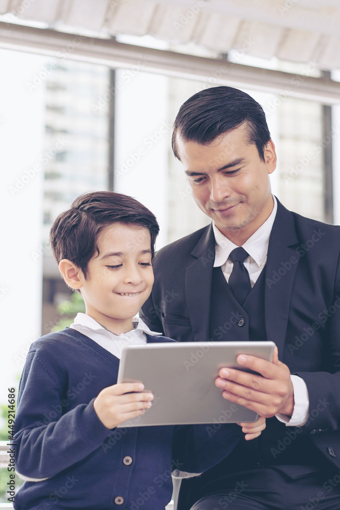 Father single dad playing game smart phone together on business district urban, Dad and Son happy family concept Father single dad playing game smart phone together on business district urban, Dad and Son happy family concept