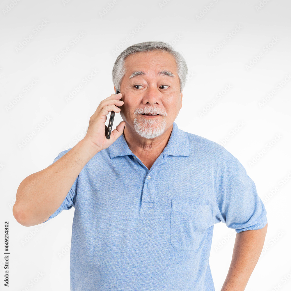 Senior Male , old man using a smartphone , smiling feel happy on white background - lifestyle senior concept Senior Male , old man using a smartphone , smiling feel happy on white background - lifestyle senior concept