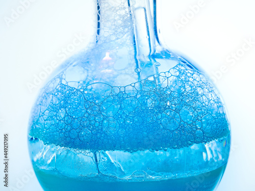 Glass flask with a chemical reagent. photo