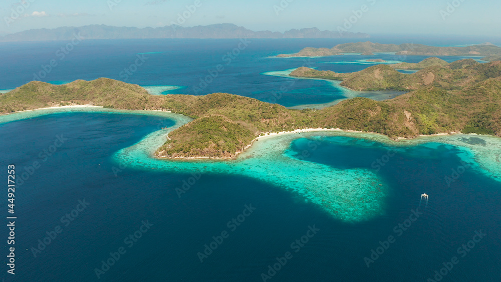 aerial seascape tropical beach with white sand and clear blue sea. tropical landscape with islands and beaches. Philippines, Palawan.