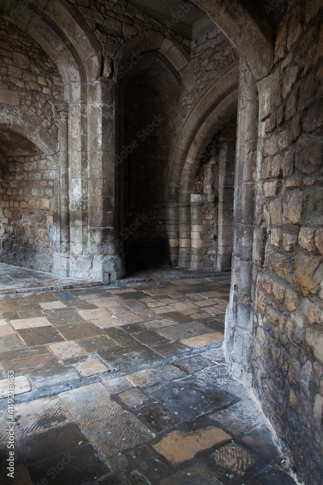 Fototapeta premium Old medieval castle stone corridors.