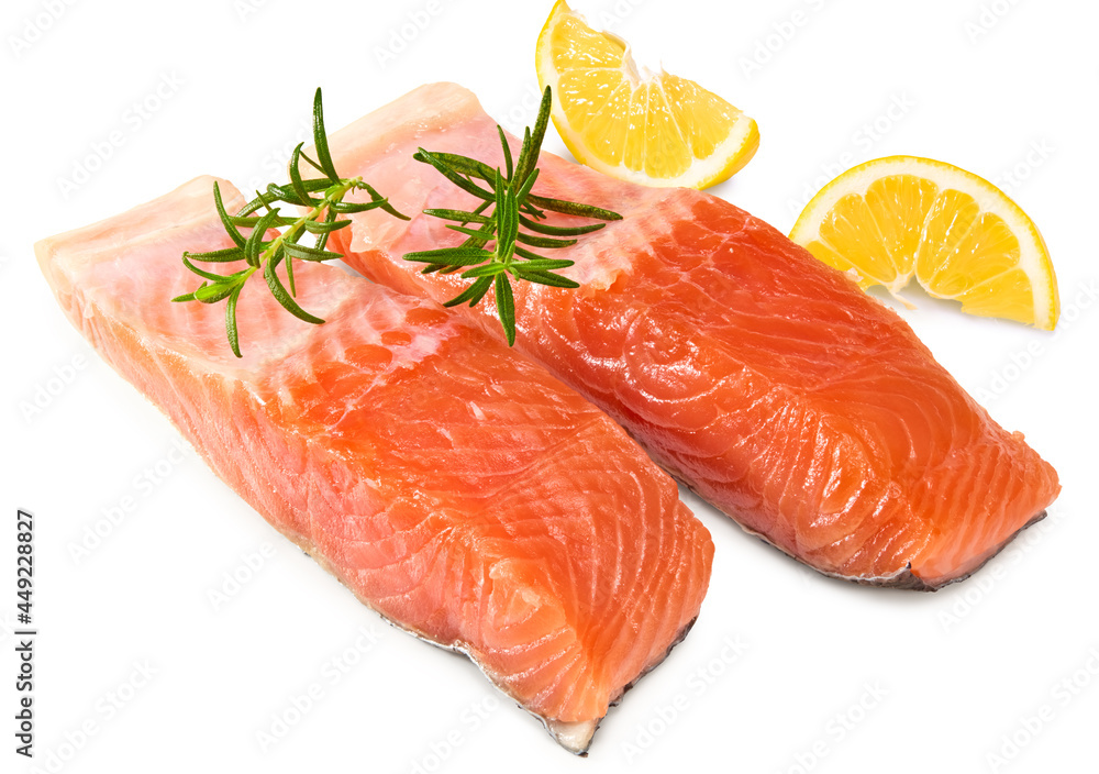 Red fish. Raw salmon fillet with rosemary and lemon isolate on white background. Clipping path and full depth of field. Red fish. Raw salmon fillet with rosemary and lemon isolate on white background. Clipping path and full depth of field.