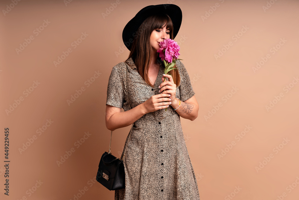 Close up romantic portrait of amazing stylish brunette woman, romantic date concept, natural make up, stylish evening outfit, beige studio background. Close up romantic portrait of amazing stylish brunette woman, romantic date concept, natural make up, stylish evening outfit, beige studio background.