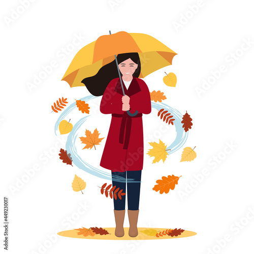 Smiling fashionable young woman in autumn clothing holds umbrella. The wind and colorful leaves swirl around her. Hello autumn season concept. Flat design vector illustration