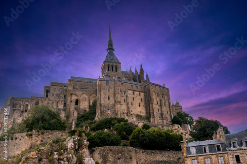 The famous Mont Saint-Michel Abbey at night in the Manche department, Normandy region, France