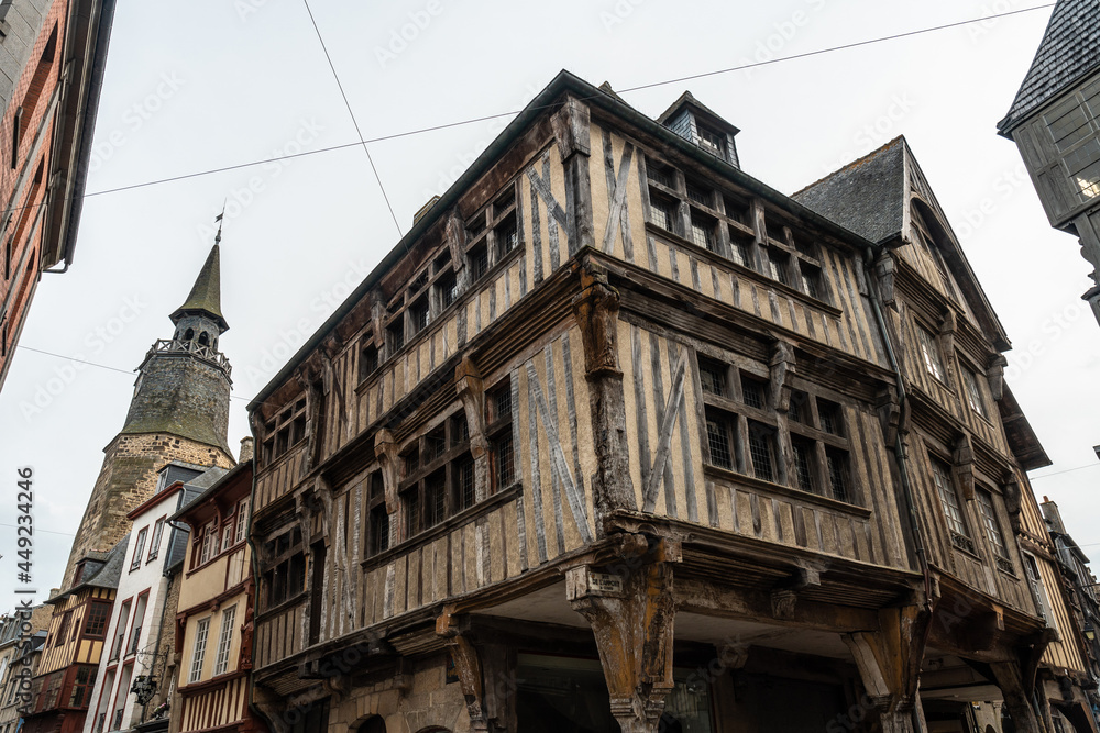 Lovely wooden houses in the old town of Dinan and its medieval castle along the Rance river in French Brittany, France