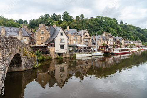 Houses and boats on the Rance river in Dinan medieval village in French Brittany, France