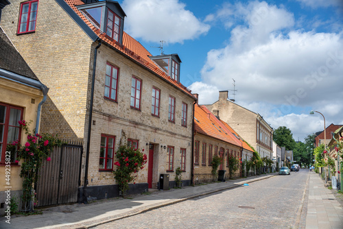 Lund, Sweden - July 2021: Characteristic Strolling streets and alleys with old Picturesque Buildings in downtown of Small travel friendly Town Lund In Skane, Sweden.