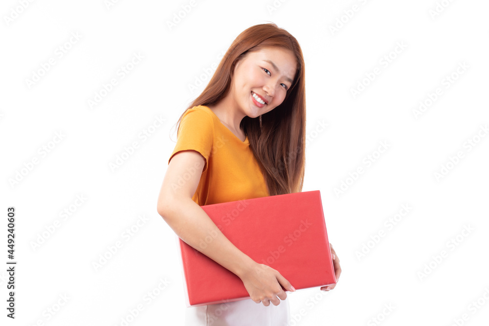 Attractive Asian woman holding gift box in christmas, new year, valentine day, birthday celebration concept. Portrait of smiling happy pretty girl hold gift box isolated on white with copy space. Attractive Asian woman holding gift box in christmas, new year, valentine day, birthday celebration concept. Portrait of smiling happy pretty girl hold gift box isolated on white with copy space.