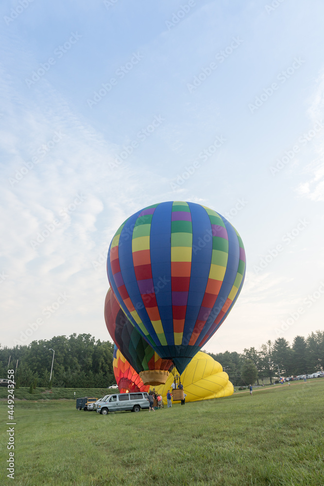 Fototapeta premium Hot air balloons takes flight in the early morning at the Wytheville Chautauqua Balloon Festival in 2021.