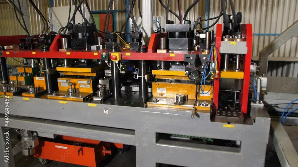 Connected machine equipment on top of production line in light spacious workshop of domestic fridges manufacturing plant Connected machine equipment on top of production line in light spacious workshop of domestic fridges manufacturing plant