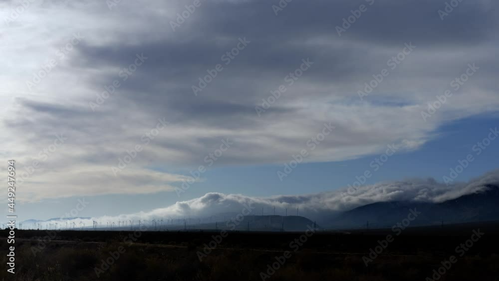 Mysterious Clouds behind Wind Farm in Mojave Desert, California, USA Mysterious Clouds behind Wind Farm in Mojave Desert, California, USA