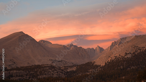 Sunset with dramatic clouds over Mount Whitney on the Pacific Crest Trail seen from Crabtree Meadows along the PCT California Section G from Walker Pass in the USA.