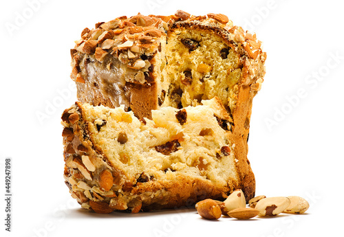 Delicious panettone with dry fruits and almond frosting isolated photo