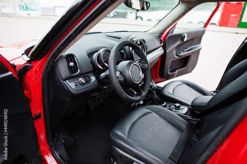 Interior of red city car. Small car for cities.
