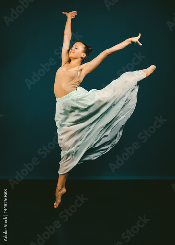 Fototapeta Naklejka Na Ścianę i Meble -  Ballet steps, split jump, Fabric drapery, Lightness and carelessness in difficult situations