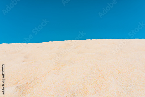 Print op canvas Scenic landscape of yellow sand dunes and blue sky background