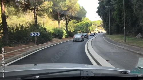 driving on a busy French Riviera road in summer