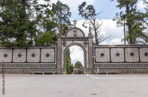 The artistic ornate Sula port entry at Bussaco Palace gardens, Portugal