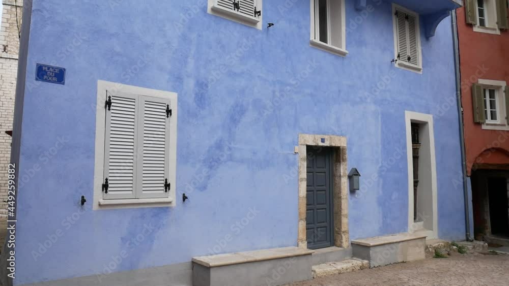 traditional blue facade in the little village of Bouyon in the Nice back country on the French Riviera in summer traditional blue facade in the little village of Bouyon in the Nice back country on the French Riviera in summer