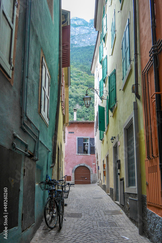 Old alley with colorful fa  ades  Riva del Garda  Italy